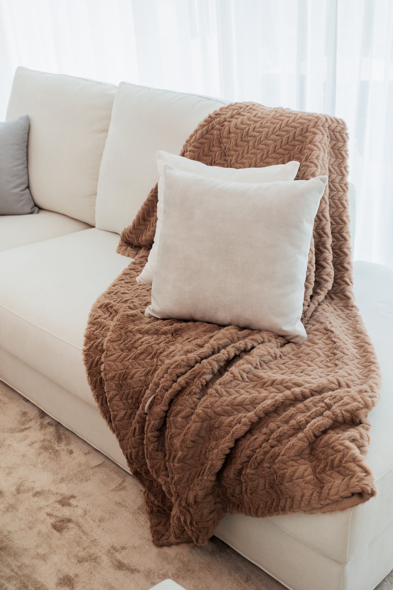 soft luxury cushions and fabric, sofas, rugs available in casares, marbella, malaga, costa del sol, amaranta living real estate interior design.