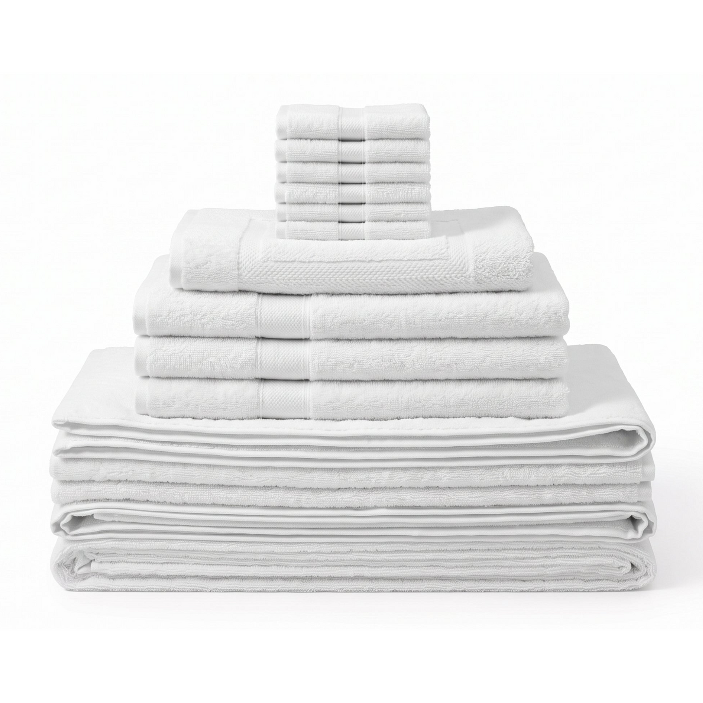 A stack of folded white towels in multiple sizes, including bath towels, hand towels, and washcloths, arranged neatly on a white background.
