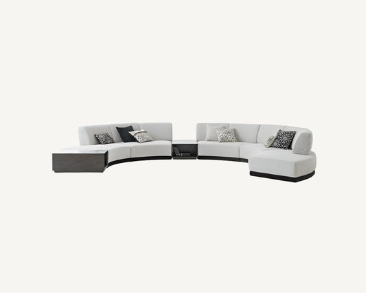 circular modern sofa in white boucle fabric with black legs available in marbella, gibraltar, bel air, estepona.