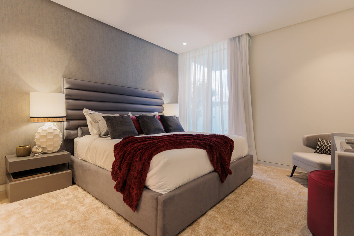 free interior design services, bedroom design, bed, headboard, bedside table, table lamp, rugs, and made to measure curtains available in bel air, malaga, marbella, costa del sol.