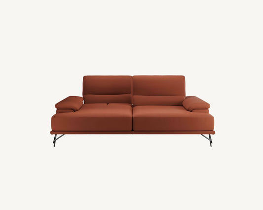 modern minimalist orange sofa with thin legs with stylish arms available in bel air, duquesa, malaga, torremolinos, el paraiso.