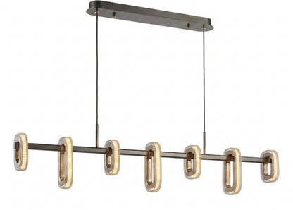 Modern linear chandelier with six elongated oval glass shades in a warm champagne-gold finish, suspended from a brushed metal bar with two thin cables.